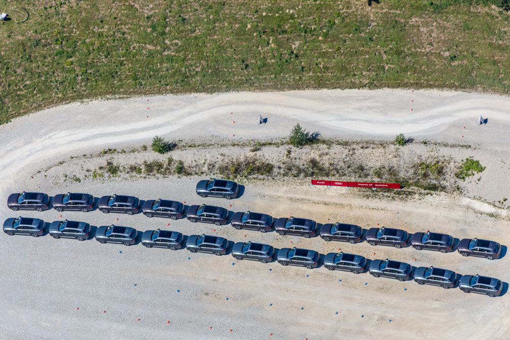 Two rows of Audi Q8s, ready for test drives