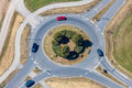 Red car in the roundabout