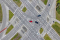 Red car at an intersection in Munich-Neuperlach 