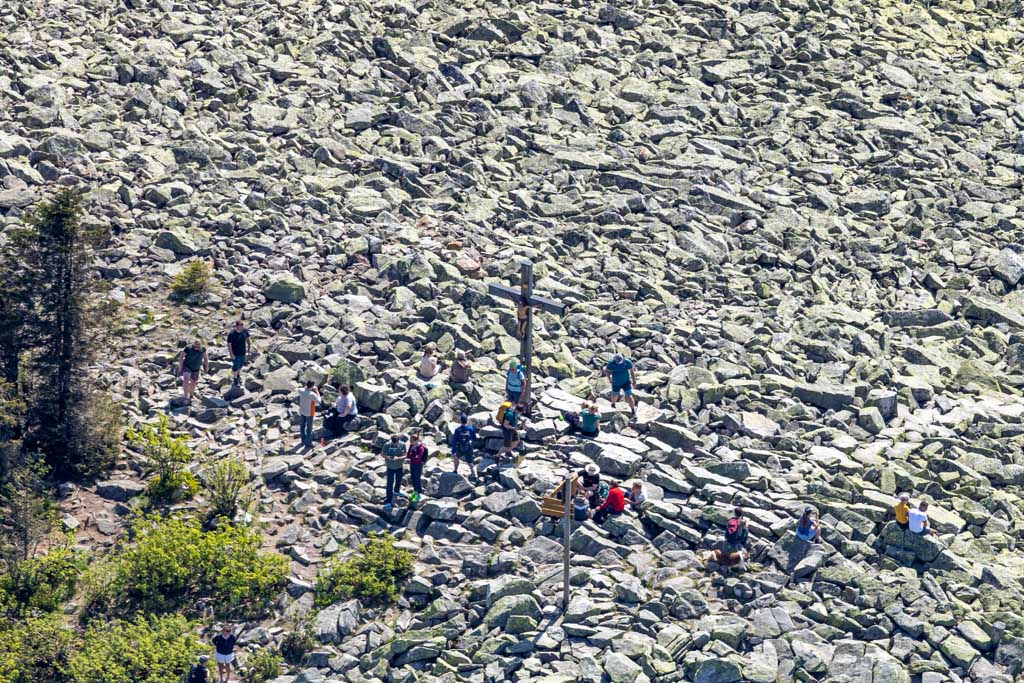 Hikers on the summit of the Lusen in the Bavarian Forest 