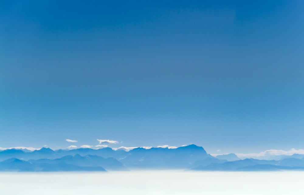 Alpine panorama with the Zugspitze in a blue haze